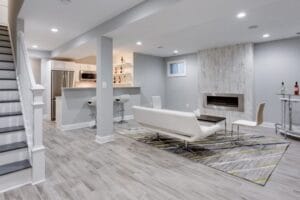 Cape Cod home addition ideas featuring a cozy finished basement with nautical design