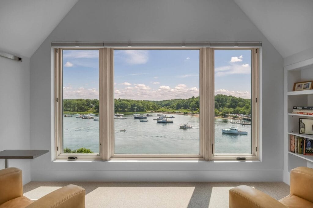 Energy-efficient picture window overlooking Cape Cod harbor, perfect for Cape Cod window replacement projects